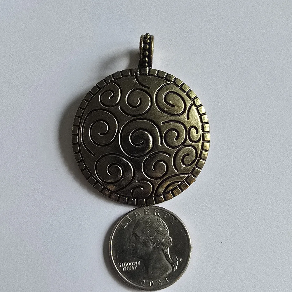 Spiral pendant gold tone domed circle big bold boho